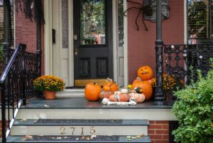 Fall home decor on a front porch.