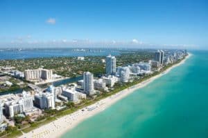 Beach in Miami with resorts and homes