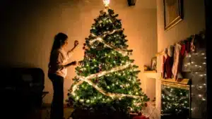 a woman decorating Christmas tree in Austin Texas